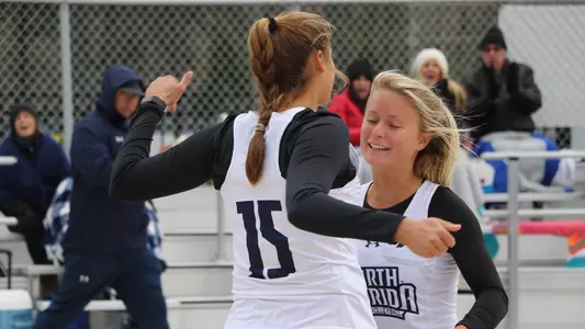 Sydni Small and Leah Maloney celebrate