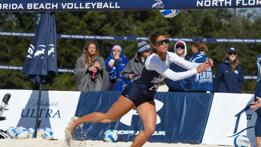 Marisa Rogers dives for a ball