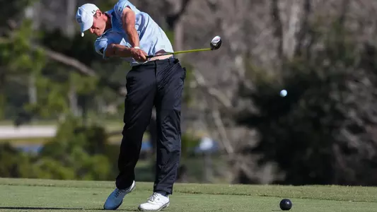 Nick Infanti hits a drive off the tee box
