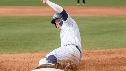 Tanner May slides to base.