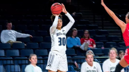 Victoria Patrick shoots a three-pointer at Liberty.