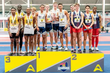 Vazquez, Shaw, Escobar, Doyle stand in first place on the podium for the DMR