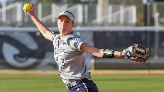 Morgan Clausen throws the softball.