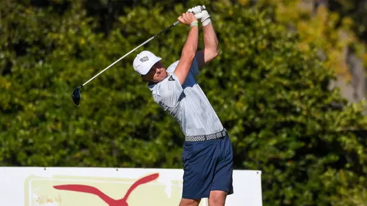 Davis Lee hits a tee shot