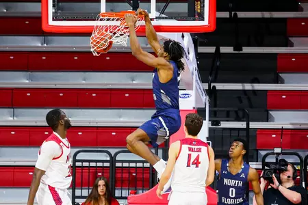 Wajid Aminu dunks the ball against NJIT