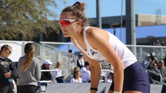Antonia Harrison awaits a serve.