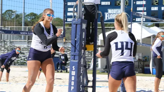Leah Maloney and Sydni Small celebrate a point
