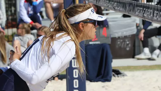 Madilyn McCarty gets ready to receive a serve