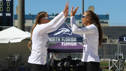 Carleigh Semeniuk and Lauren Galinis high five