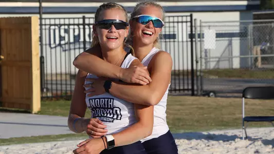 Jessi Freeman and Blaire Register hug