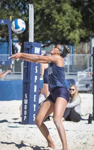 Gabby O'Connell digs the ball out.