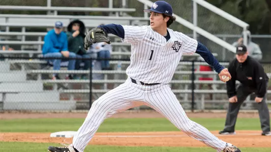Ryan Jean rears back to deliver a pitch.