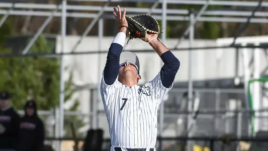 Ricky Presno looks up to catch a pop up.