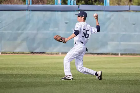 Cade Reich throws the ball.