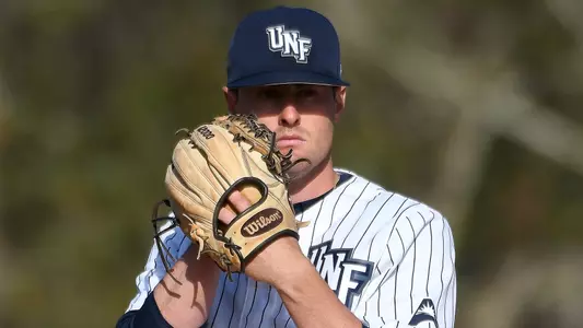 Brandon Reitz looks on.