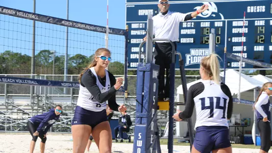 Sydni Small and Leah Maloney celebrate a point