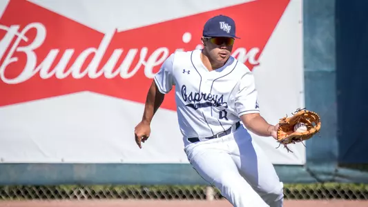 Raff Libunao catches the ball in his left mitt in the outfield