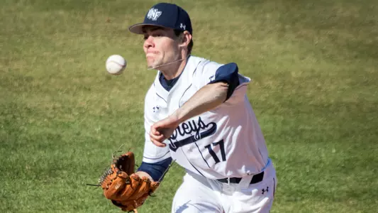 Eddie Miller looks to catch the baseball