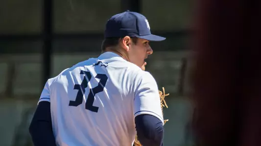 Tony Roca looks on to throw a pitch