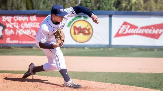 Tony Roca throws a pitch from the mound