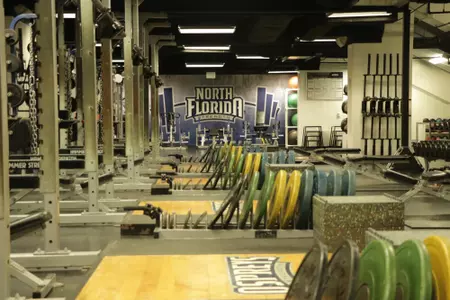 Strength and conditioning weights laid out on the floor