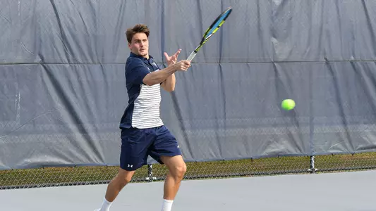 Dominik Barton follows through on a forehand