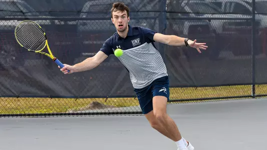 Matt Carroll goes for a forehand