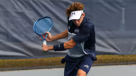 PJ kotan has a two-hand backhand slice