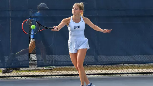 Annabelle Davis hitting the ball.