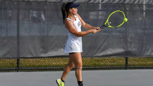 Anapaula Melilo Striking a Backhand
