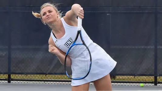 Summer Yardley Serves the Ball