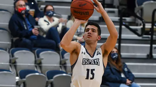 Jose Placer shoots the basketball