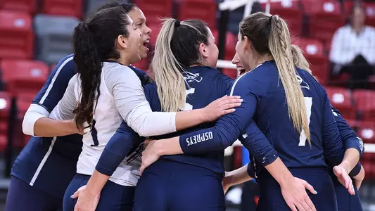UNF volleyball team celebration