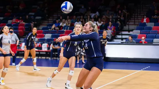 Annie Antar sets the ball.