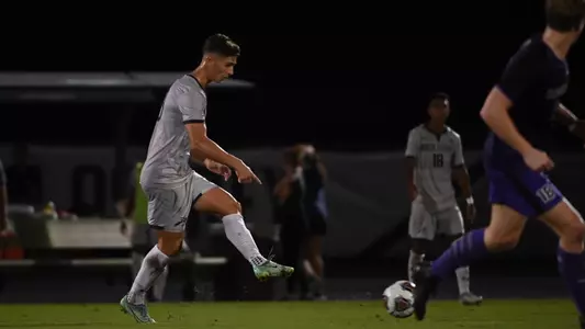 Burka dribbling against Lipscomb