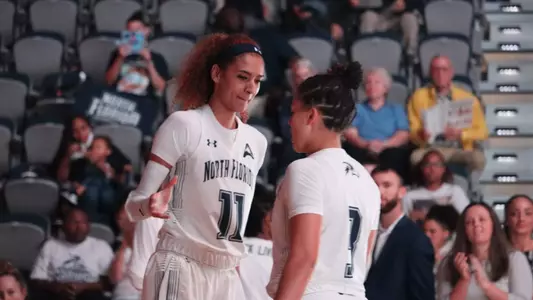 Jazz Bond and Tiffany Tolbert high five