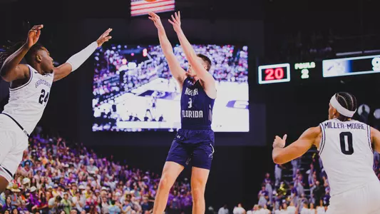 Carter Hendricksen shoots a jumper