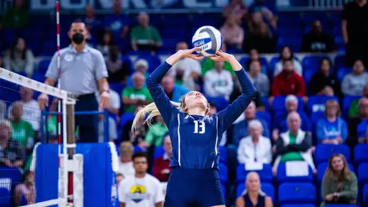 Annie Antar sets the ball.