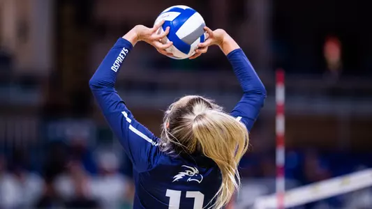 Annie Antar sets the ball.