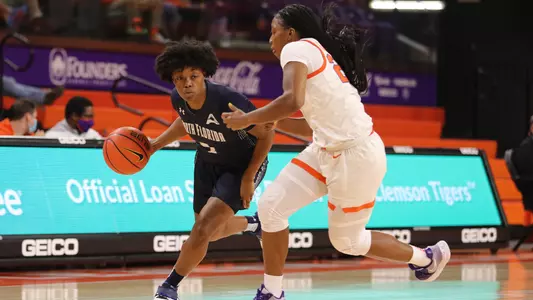 Nubia Benedith takes the ball to the hoop.