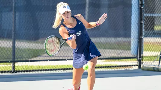 Kendall Nash swings with a forehand