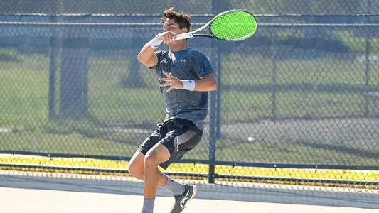 Breno Marques hits a forehand