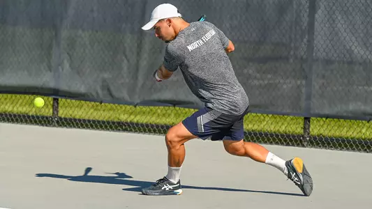 Joe Ellis hits a backhand