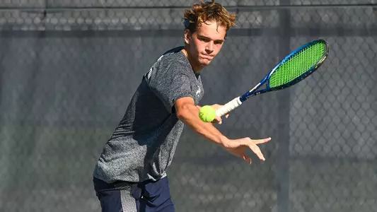 PJ Kotan hits a forehand