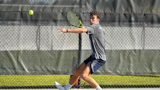 Matt Carroll hits a forehand