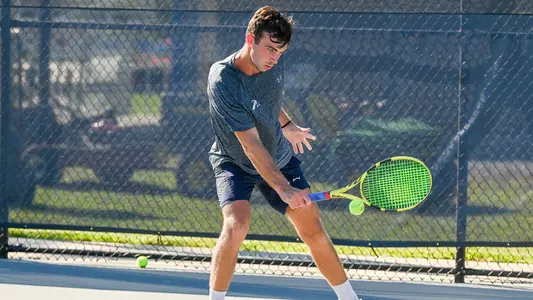 Matt Carroll hits a backhand