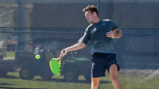 Matt Carroll hits a forehand