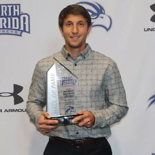 Alex Morrell poses with his HOF trophy
