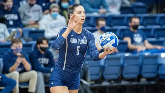 Julianna Askew serves the ball at UConn