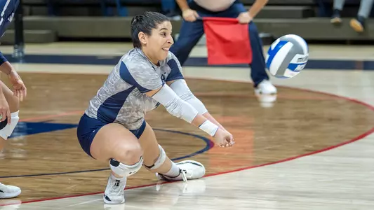 Rocio Moro digs the ball
